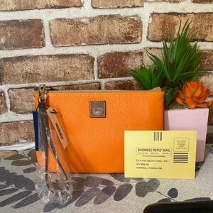 Dooney & Bourke Orange large Wristlet